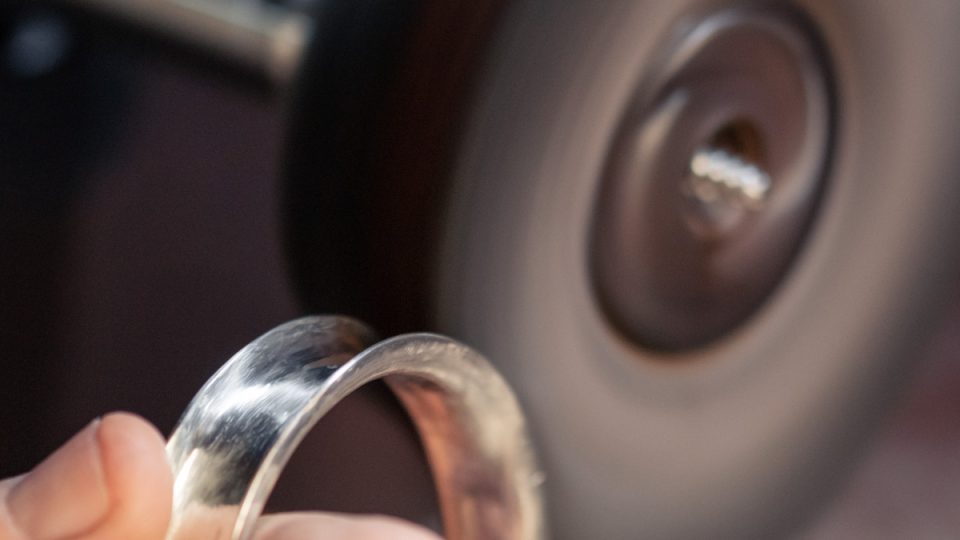 Anticlastic bangle being polished with a polishing motor