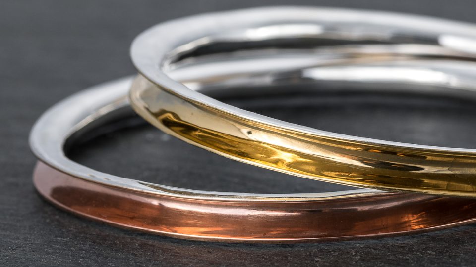 Silver anticlastic raised bangles