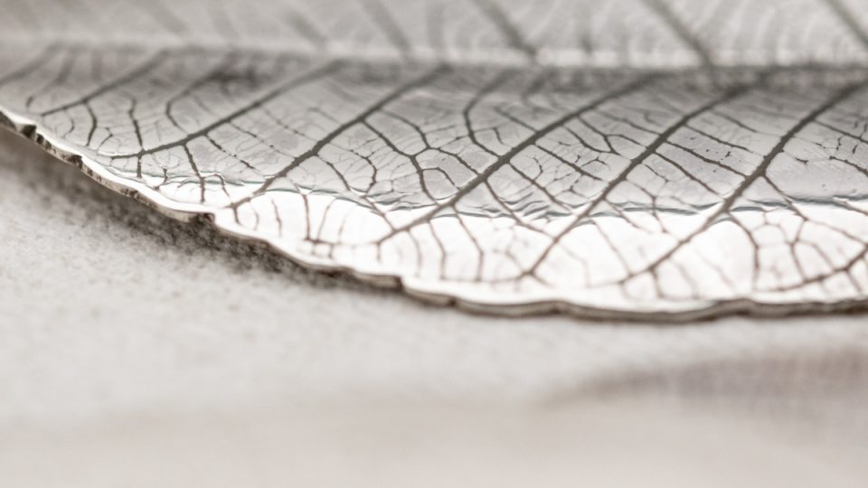 Detail of a silver leaf pendant
